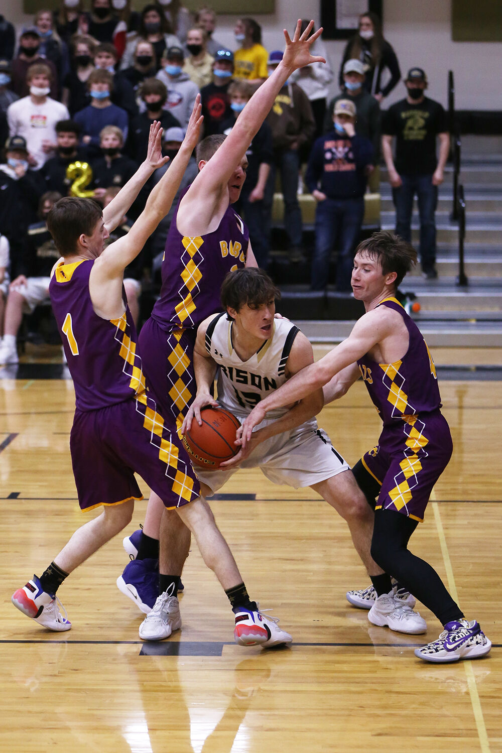 Nathan Killian pulls the ball away